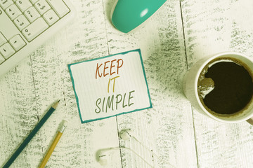 Writing note showing Keep It Simple. Business concept for to make something easy to understand and...