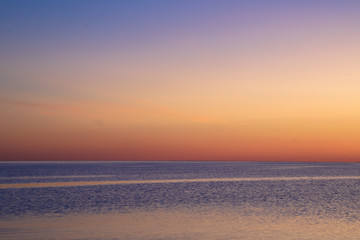 Fototapeta na wymiar landscape in blue and pink colors - beautiful calm sunset