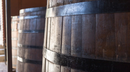 Old wooden wine barrels, horizontal banner