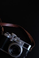 retro camera with leather strap