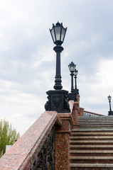 Fototapeta premium Classic style city lamppost at sunset, close up