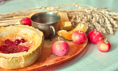 Homemade baked sweet pumpkin with cranberries traditional autumn dish