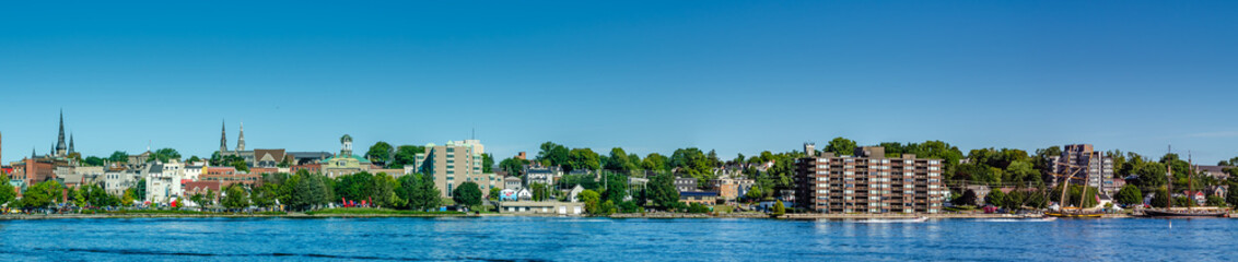 Panorama of Brockville waterfront with tall ships