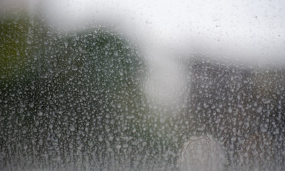 windows glass with with dust mix with rain