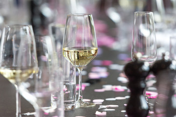 Glasses of wine on table after party