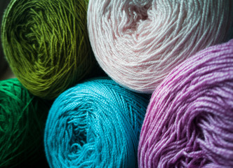 Silk rug green and purple on grey cloth