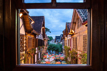 Swiss architecture in Campos do Jordão. Street with umbrella decorating cold tourist city of Sao...