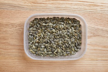 Sunflower seeds in a box, raw food ingredient