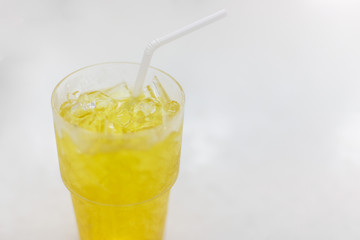 Chrysanthemum tea and ice in a glass on marble table