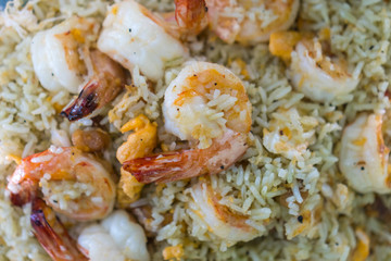 Top view of Thai food fried rice with shrimp and egg.