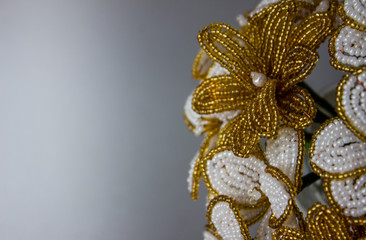 Golden flower macro shot. Flowers from the beads.