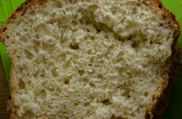 Sectional bread on a green background. Bread close-up.