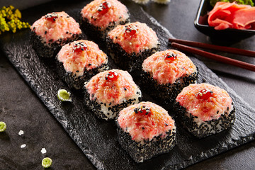 Baked roll with shrimp and masago caviar cap