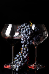 glass of white wine and grapes