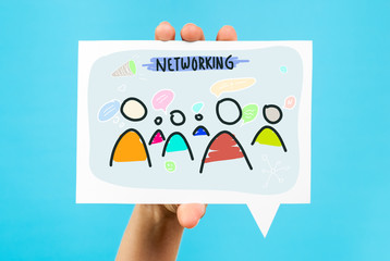 Networking sketching concept on speech bubble and blue background.