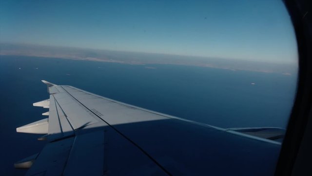 View from plane window whilst flying over Greece