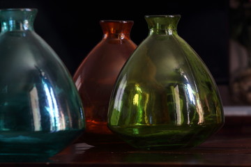 Colourful glass and ceramic containers