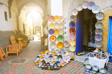 Colorful crafts shop with ceramic art on a traditional moroccan market in medina of Marrakech, Morocco in Africa