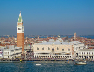 Fototapeta na wymiar Grand Canal in Venice, Italy. Scenic panoramic view on Venetian landmarks - water surface and seafront with buildings and architecture attractions. 