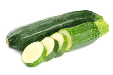 fresh green zucchini with slices isolated on white background