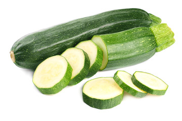 fresh green zucchini with slices isolated on white background