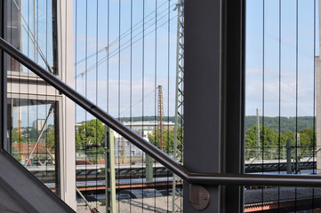 view from staircase of pedestrian bridge over station
