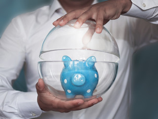Piggy bank in the form of a pig. The idea of saving savings. Investing in your future. Money accumulation plan, annuity insurance.