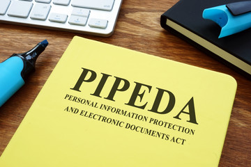 Personal information protection and electronic documents act PIPEDA on the desk.