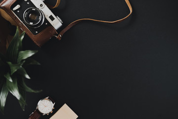 Top view of a flat lay film camera in a case