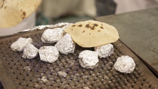 Indian Chapati Pulka or Gehu Roti on steel pan It's a Healthy fiber rich traditional North/South Indian food, 