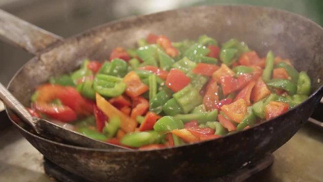 Healthy vegetables Green capcium and  tomato in frying pan 