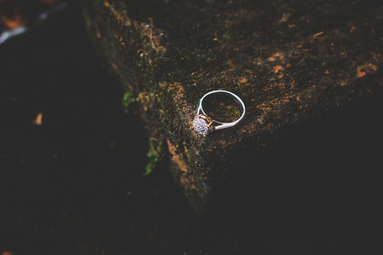 Beautifully elegant gold ring with diamond decoration. Jewelry photo.