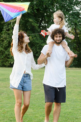 Happy young family in the park