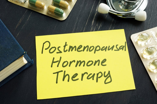 Postmenopausal hormone therapy PHT, PMHT sign on a page.