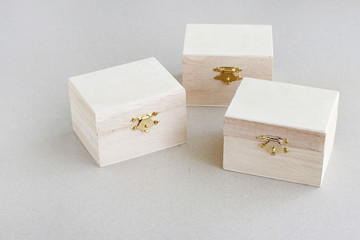 Wooden boxes on grey background
