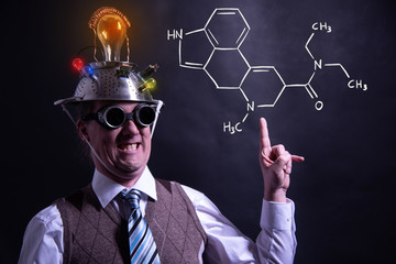 Nerd presenting handdrawn chemical formula of formic LSD