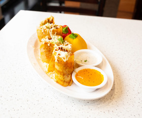 South Indian Cheese Spring Dosa Also Know as Cheese Masala Dosa or Masala Dosa Served With Coconut Chutney, Sauce And Sambar