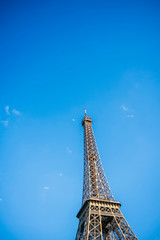 The top of the Eiffel Tower in the sunlight