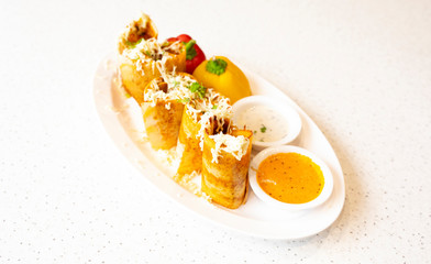 South Indian Cheese Spring Dosa Also Know as Cheese Masala Dosa or Masala Dosa Served With Coconut Chutney, Sauce And Sambar