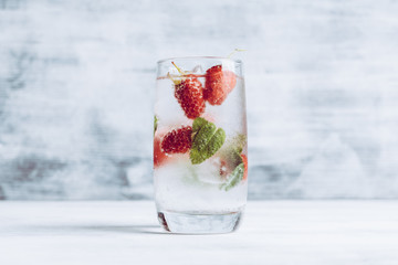 Raspberry mojito cocktail on the rustic background. Selective focus. Shallow depth of field.