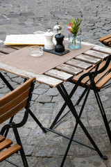 outdoor folding set of wood and metal from a street restaurant