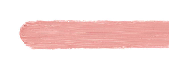 Color corrector stroke isolated on white background. Peach color correcting cream concealer smudge...