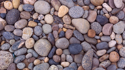 river stones ocean stones sea stones random closeup of random color and size stones 