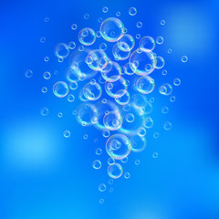 Realistic transparent floating soap bubbles with rainbow reflection. Design element for advertising booklet, flyer or poster