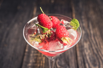 Raspberry martini cocktail. Selective focus. Shallow depth of field.