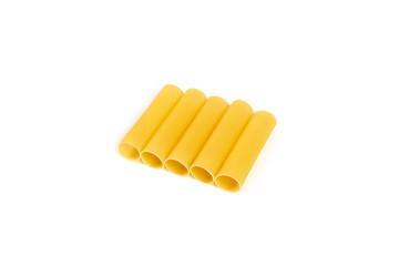 Italian cannelloni pasta tubes isolated over white background.