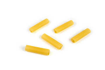 Italian cannelloni pasta tubes isolated over white background.