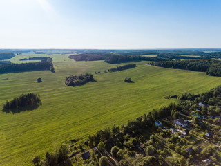 Fototapeta na wymiar aerial photography rural landscape green fields, meadows and forest