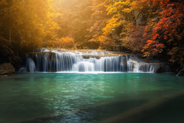 Fototapeta na wymiar Beautiful Nature Scenic of Waterfall in Autumn Season Forest, Amazing Colorful Natural Landscape Scenery of Water Falls in Tropical. Paradise Fall With Emerald Pool in Jungle, Travel Place/ Outdoors