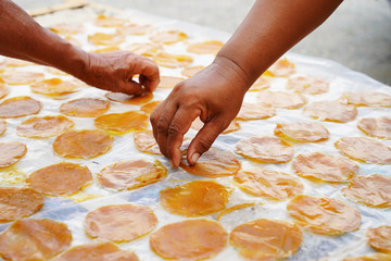 Mango sheet dried on plastic, preserving food from ripe mangoes,Traditional Thai dessert call : Mamuang Kuan.  